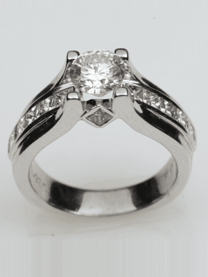 Channel Set Princess Cut Side Stone Engagement Ring