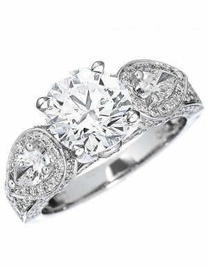 Round Brilliant With Pear-shaped Side Stone Engagement Rings